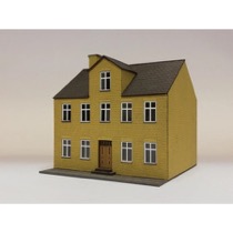 Byhus med kvist. 2 etager. Gule mursten 